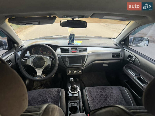 Мицубиси Лансер, объемом двигателя 2 л и пробегом 185 тыс. км за 4750 $, фото 8 на Automoto.ua