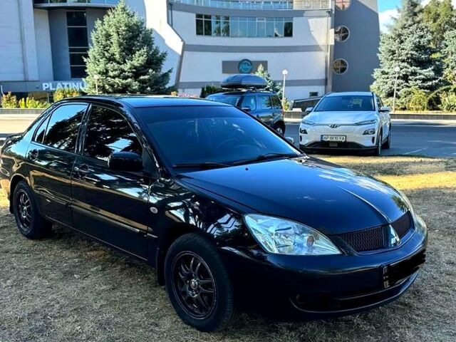 Міцубісі Lancer, об'ємом двигуна 1.6 л та пробігом 248 тис. км за 4600 $, фото 1 на Automoto.ua