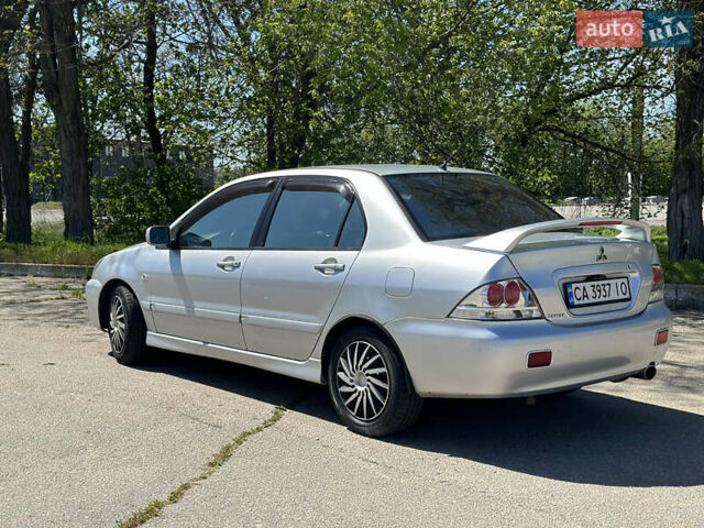 Мицубиси Лансер, объемом двигателя 2 л и пробегом 250 тыс. км за 4400 $, фото 1 на Automoto.ua