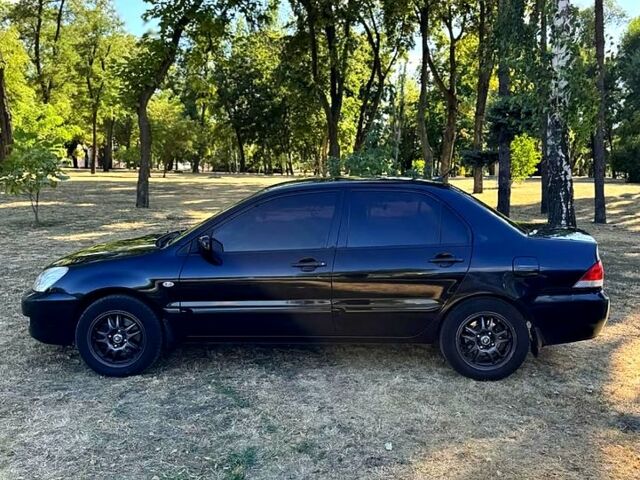 Міцубісі Lancer, об'ємом двигуна 1.6 л та пробігом 248 тис. км за 4600 $, фото 4 на Automoto.ua