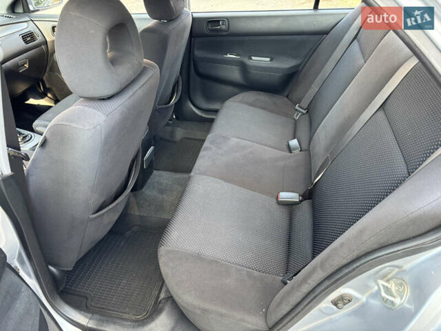 Мицубиси Лансер 2007 в Киеве на Automoto.ua Мицубиси Лансер, объемом двигателя 1.6 л и пробегом 119 тыс. км за 4850 $, фото 11 на Automoto.ua