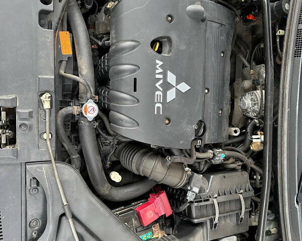 Міцубісі Lancer, об'ємом двигуна 2 л та пробігом 220 тис. км за 7400 $, фото 42 на Automoto.ua