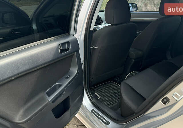 Мицубиси Лансер, объемом двигателя 2 л и пробегом 195 тыс. км за 7300 $, фото 10 на Automoto.ua