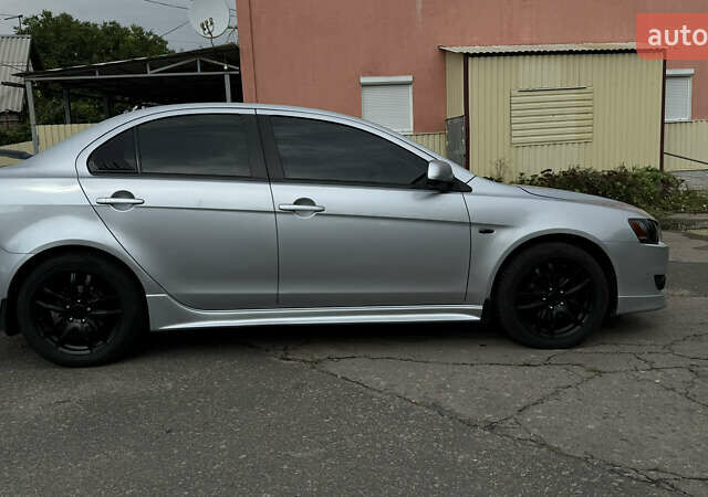 Мицубиси Лансер, объемом двигателя 2 л и пробегом 195 тыс. км за 7300 $, фото 1 на Automoto.ua