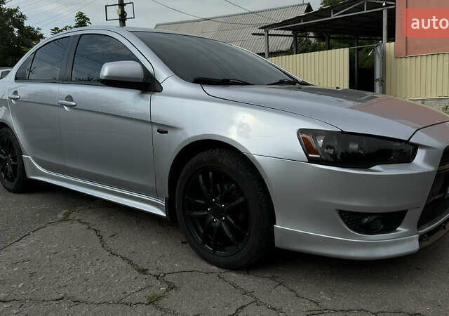 Мицубиси Лансер, объемом двигателя 2 л и пробегом 195 тыс. км за 7300 $, фото 2 на Automoto.ua