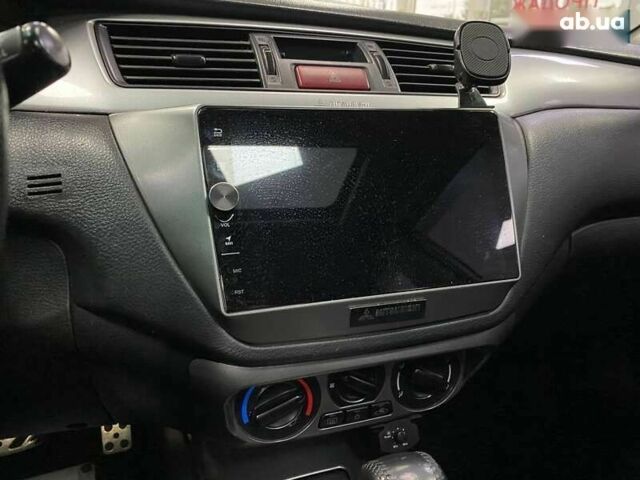Міцубісі Lancer, об'ємом двигуна 0 л та пробігом 303 тис. км за 5990 $, фото 22 на Automoto.ua