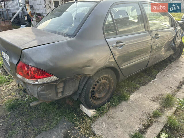 Міцубісі Lancer, об'ємом двигуна 1.6 л та пробігом 200 тис. км за 999 $, фото 1 на Automoto.ua
