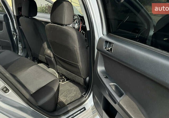 Мицубиси Лансер, объемом двигателя 2 л и пробегом 195 тыс. км за 7300 $, фото 12 на Automoto.ua