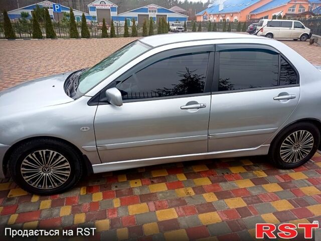 Мицубиси Лансер, объемом двигателя 1.6 л и пробегом 230 тыс. км за 3800 $, фото 1 на Automoto.ua