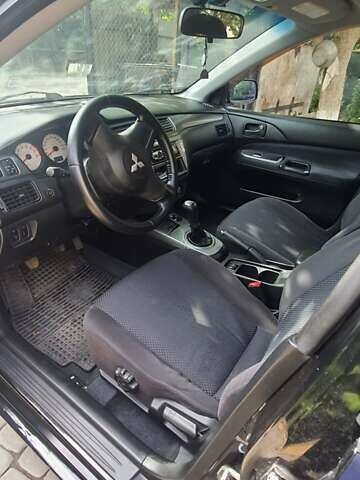 Мицубиси Лансер, объемом двигателя 1.58 л и пробегом 220 тыс. км за 4200 $, фото 8 на Automoto.ua