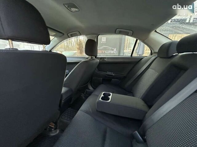 Міцубісі Lancer, об'ємом двигуна 2 л та пробігом 250 тис. км за 8400 $, фото 22 на Automoto.ua