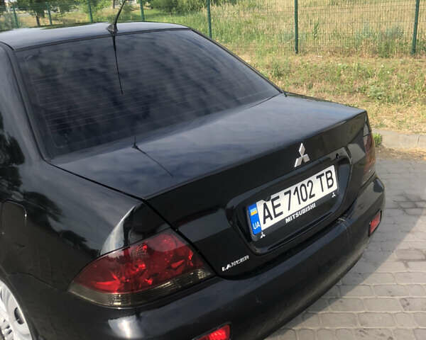 Мицубиси Лансер, объемом двигателя 1.6 л и пробегом 230 тыс. км за 5000 $, фото 4 на Automoto.ua
