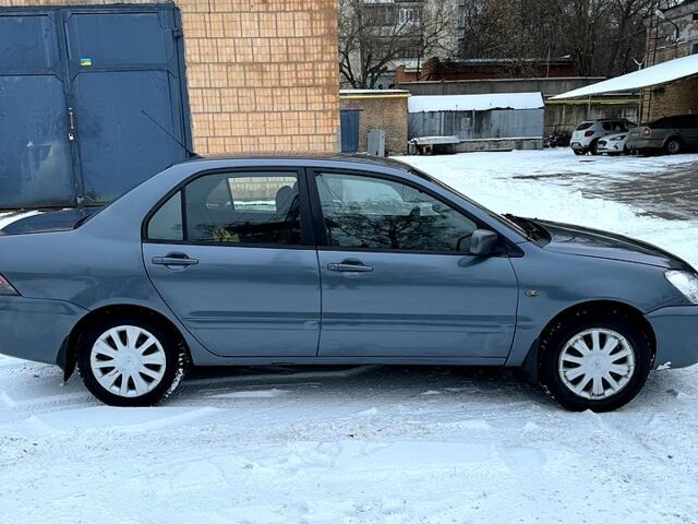 Міцубісі Lancer, об'ємом двигуна 1.6 л та пробігом 187 тис. км за 3600 $, фото 7 на Automoto.ua