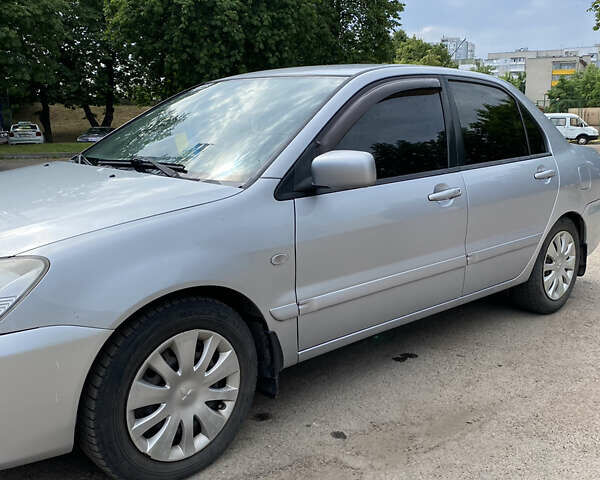 Мицубиси Лансер, объемом двигателя 1.58 л и пробегом 210 тыс. км за 4000 $, фото 2 на Automoto.ua