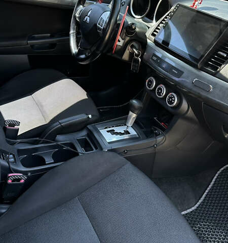 Мицубиси Лансер, объемом двигателя 2 л и пробегом 195 тыс. км за 7300 $, фото 25 на Automoto.ua