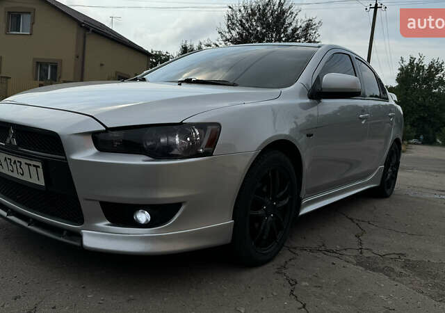 Мицубиси Лансер, объемом двигателя 2 л и пробегом 195 тыс. км за 7300 $, фото 4 на Automoto.ua