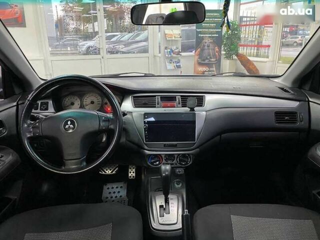 Міцубісі Lancer, об'ємом двигуна 0 л та пробігом 303 тис. км за 5990 $, фото 21 на Automoto.ua