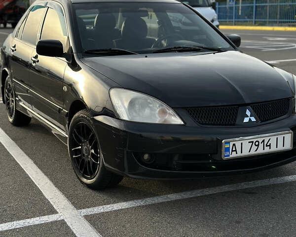 Міцубісі Lancer, об'ємом двигуна 1.58 л та пробігом 234 тис. км за 4050 $, фото 2 на Automoto.ua