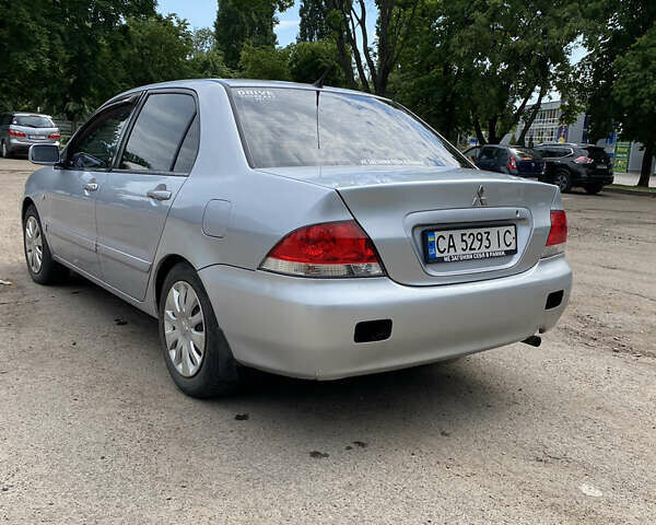 Мицубиси Лансер, объемом двигателя 1.58 л и пробегом 210 тыс. км за 4000 $, фото 5 на Automoto.ua