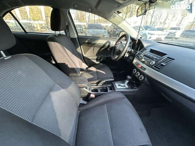 Міцубісі Lancer, об'ємом двигуна 2 л та пробігом 250 тис. км за 8400 $, фото 28 на Automoto.ua