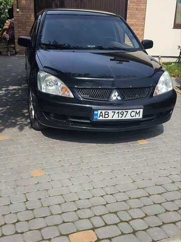 Мицубиси Лансер, объемом двигателя 1.58 л и пробегом 220 тыс. км за 4200 $, фото 1 на Automoto.ua