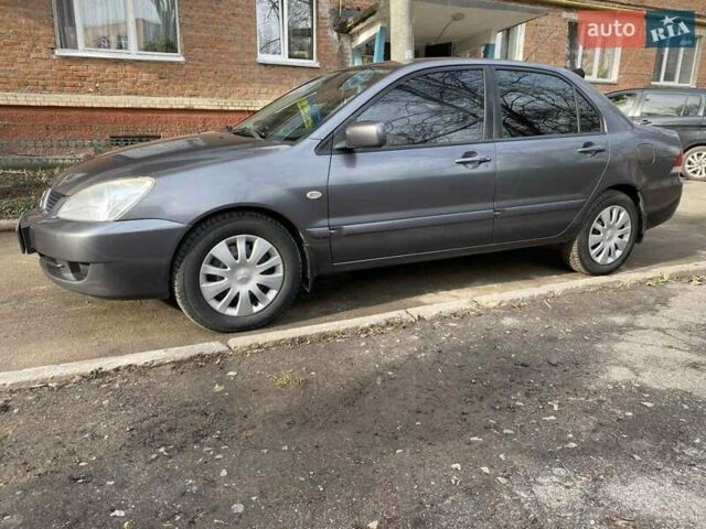 Міцубісі Lancer, об'ємом двигуна 1.58 л та пробігом 252 тис. км за 4799 $, фото 3 на Automoto.ua