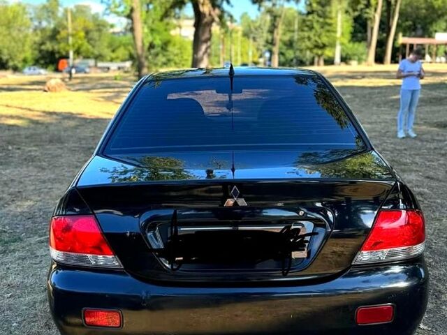 Міцубісі Lancer, об'ємом двигуна 1.6 л та пробігом 248 тис. км за 4600 $, фото 3 на Automoto.ua