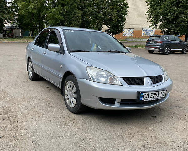 Мицубиси Лансер, объемом двигателя 1.58 л и пробегом 210 тыс. км за 4000 $, фото 6 на Automoto.ua
