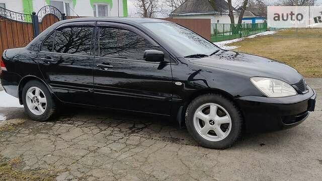 Міцубісі Lancer, об'ємом двигуна 1.6 л та пробігом 162 тис. км за 4200 $, фото 3 на Automoto.ua