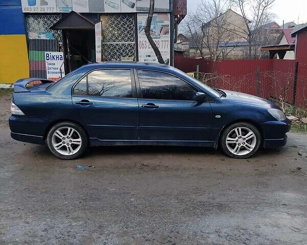 Міцубісі Lancer, об'ємом двигуна 2 л та пробігом 190 тис. км за 4999 $, фото 7 на Automoto.ua