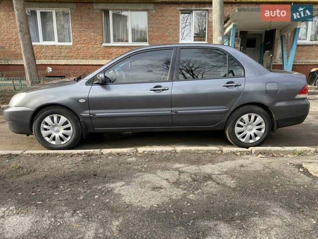 Міцубісі Lancer, об'ємом двигуна 1.58 л та пробігом 252 тис. км за 4799 $, фото 5 на Automoto.ua