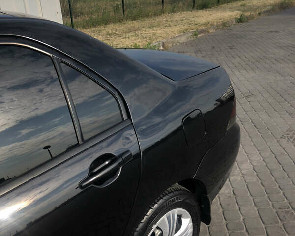 Мицубиси Лансер, объемом двигателя 1.6 л и пробегом 230 тыс. км за 5000 $, фото 3 на Automoto.ua