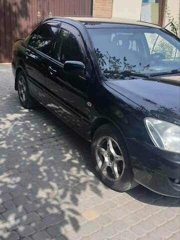 Мицубиси Лансер, объемом двигателя 1.58 л и пробегом 220 тыс. км за 4200 $, фото 3 на Automoto.ua