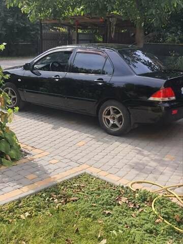 Мицубиси Лансер, объемом двигателя 1.58 л и пробегом 220 тыс. км за 4200 $, фото 4 на Automoto.ua