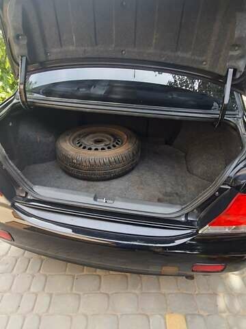 Мицубиси Лансер, объемом двигателя 1.58 л и пробегом 220 тыс. км за 4200 $, фото 12 на Automoto.ua