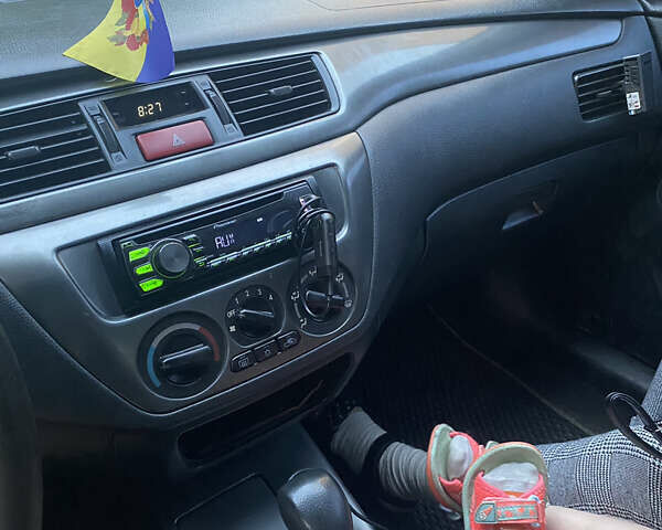 Мицубиси Лансер, объемом двигателя 1.58 л и пробегом 210 тыс. км за 4000 $, фото 10 на Automoto.ua