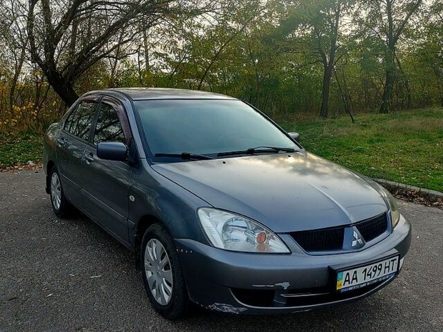 Мицубиси Лансер, объемом двигателя 1.6 л и пробегом 238 тыс. км за 3000 $, фото 5 на Automoto.ua