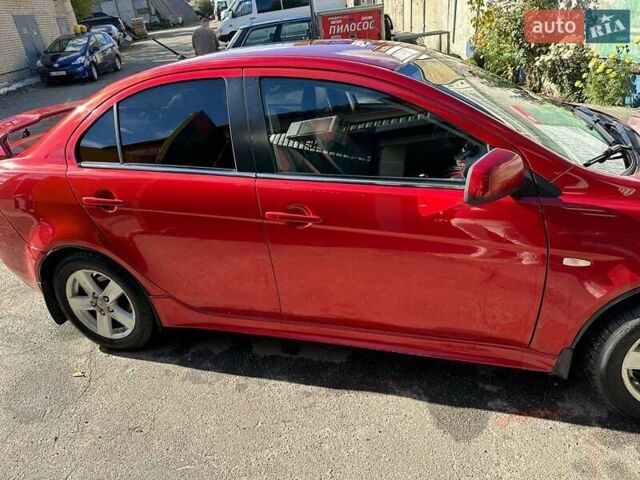 Міцубісі Lancer 2008 у Києві на Automoto.ua Міцубісі Lancer, об'ємом двигуна 2 л та пробігом 270 тис. км за 7300 $, фото 14 на Automoto.ua