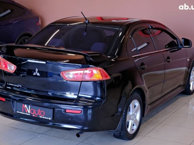 Мицубиси Лансер, объемом двигателя 2 л и пробегом 131 тыс. км за 6900 $, фото 4 на Automoto.ua