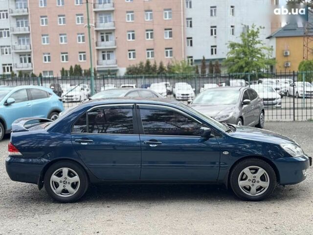 Мицубиси Лансер, объемом двигателя 1.6 л и пробегом 232 тыс. км за 4400 $, фото 6 на Automoto.ua