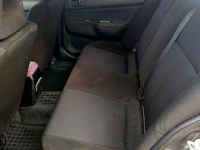 Мицубиси Лансер, объемом двигателя 1.6 л и пробегом 238 тыс. км за 3000 $, фото 10 на Automoto.ua