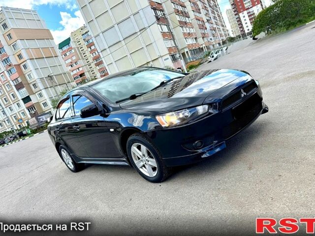 Мицубиси Лансер, объемом двигателя 2 л и пробегом 204 тыс. км за 7590 $, фото 6 на Automoto.ua