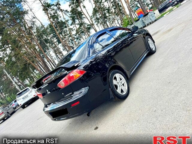 Мицубиси Лансер, объемом двигателя 2 л и пробегом 204 тыс. км за 7590 $, фото 4 на Automoto.ua