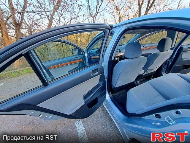 Мицубиси Лансер, объемом двигателя 20 л и пробегом 171 тыс. км за 7100 $, фото 11 на Automoto.ua