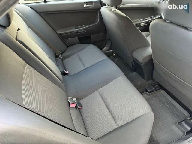 Міцубісі Lancer, об'ємом двигуна 2 л та пробігом 230 тис. км за 6800 $, фото 28 на Automoto.ua