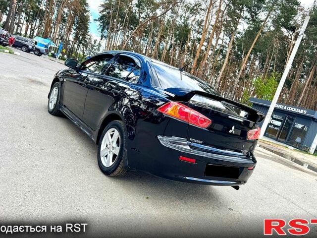 Мицубиси Лансер, объемом двигателя 2 л и пробегом 204 тыс. км за 7590 $, фото 2 на Automoto.ua