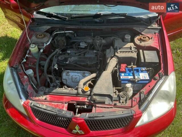 Мицубиси Лансер, объемом двигателя 1.6 л и пробегом 159 тыс. км за 4450 $, фото 19 на Automoto.ua