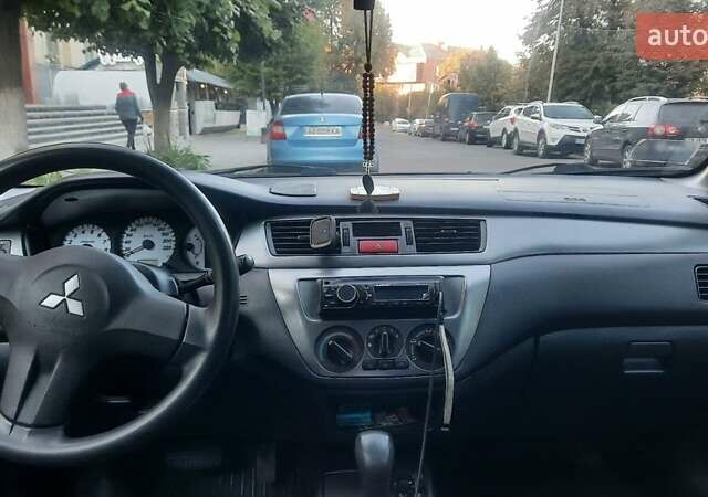 Мицубиси Лансер, объемом двигателя 1.6 л и пробегом 186 тыс. км за 4500 $, фото 6 на Automoto.ua