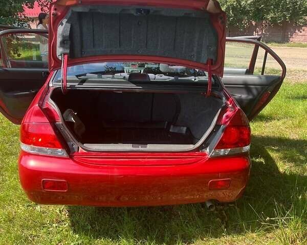 Мицубиси Лансер, объемом двигателя 1.6 л и пробегом 159 тыс. км за 4450 $, фото 23 на Automoto.ua