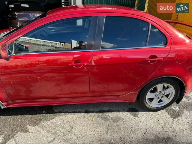 Міцубісі Lancer 2008 у Києві на Automoto.ua Міцубісі Lancer, об'ємом двигуна 2 л та пробігом 270 тис. км за 7300 $, фото 15 на Automoto.ua